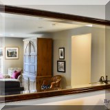 D09. Beveled glass mirror. 35”h x 64”w 